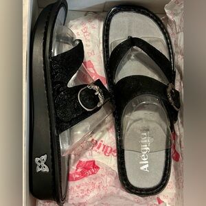 Alegria Black Slide Sandals with Silver Buckle
